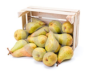 Spilled pears from wooden crate