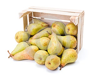 Spilled pears from wooden crate