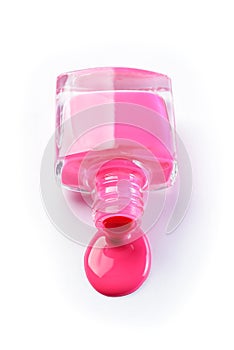 Spilled pink nail polish as sample of cosmetics product