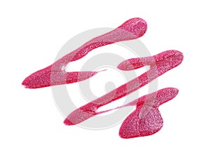 Spilled pink nail polish isolated on white background