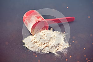 Spilled scoop of protein powder