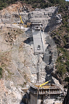 Spillway construction in a new dam photo