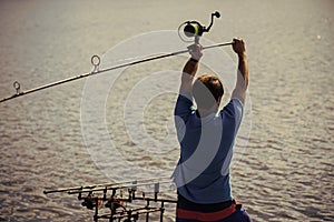 Spin fishing, angling, catching fish. Hobby, vacation, pastime