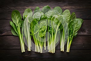 Spinach arranged on kitchen table, fresh and nutritious greens