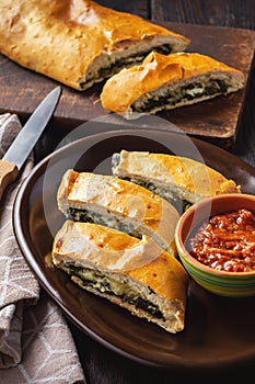 Spinach and cheese stromboli, italian cuisine.