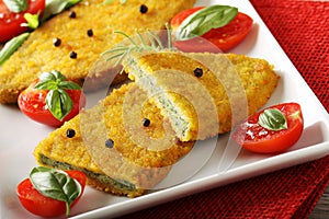 Spinach cutlets with tomato salad