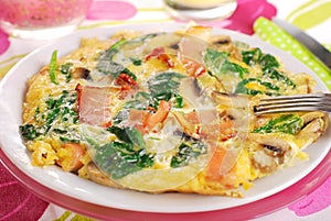 Spinach frittata with mushroom,ham and dried tomato