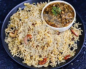 Spinach lentil curry served with sindhi Pulao photo