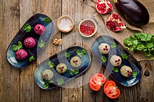 spinach phali, bean phali, beet phali top view on old wooden table Georgian cuisine