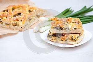 Spinach pie or spanakopita with spinach, cheese, eggs, onion