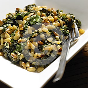 Spinach with pine nuts