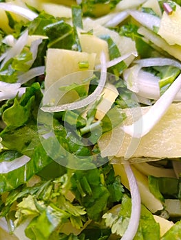 Spinach, potato, onion mixed for making food items