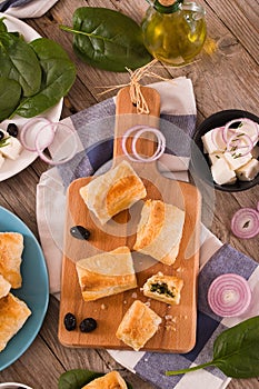 Spinach puffs with feta cheese.