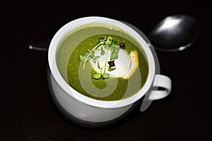 Spinach soup with decorated egg