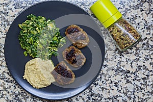 Spinach, Turkish kofte and Humus