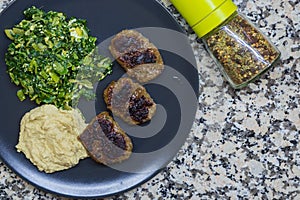 Spinach, Turkish kofte and Humus