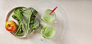 Spinach and yogurt smoothie with apple. Juicy spinach leaves and ripe red apple. Healthy eating, top view