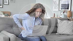 Spinal Back Pain while Curly Hair Woman Working in Creative Office