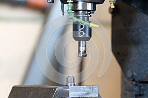 Spindle with a milling cutter in a mandrel on a CNC milling machine