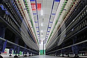 spindles on the production line in workshop
