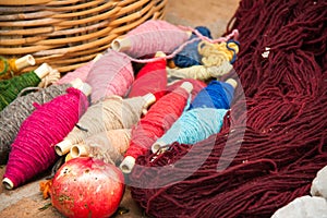 Spindles of spun yarn photo