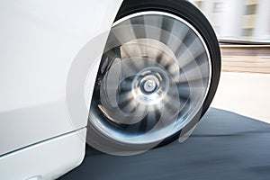 Spining car wheel photo