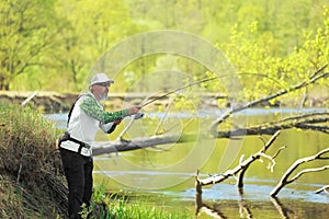 Spining fishing, angling, catching fish. Hobby and vacation