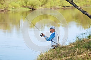 Spining fishing, angling, catching fish. Hobby and vacation