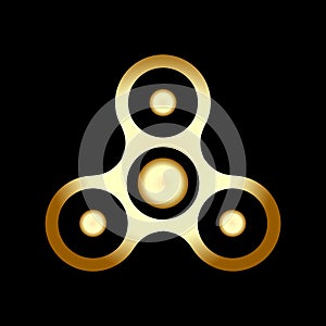 Spinner on bearings rotates three-pointed gold on dark