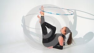 Spinning acrobat beautiful hula hoops in slow motion