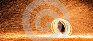 Spinning burning steelwool photo