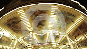 Spinning carousel under the roof