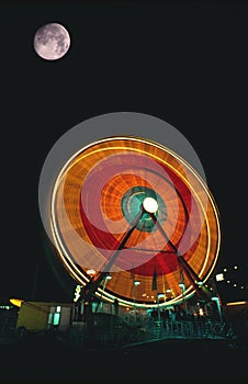 Spinning Ferris Wheel at Night