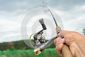 Spinning fishing is an exciting activity. Sport fishing.