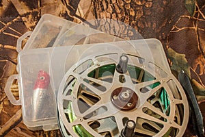 spinning lures in the box and fishing reel