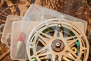 spinning lures in the box and fishing reel