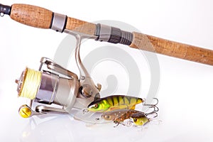 Spinning rod and reel with wobbler lure