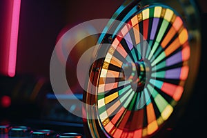 Spinning roulette wheel on a colorful banner background