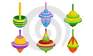 Spinning Top Vector Set. Colorful Childish Pegtop Collection