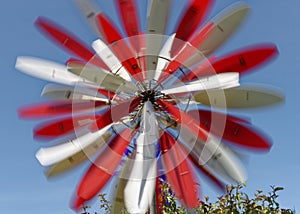 Spinning wheel sculpture photo