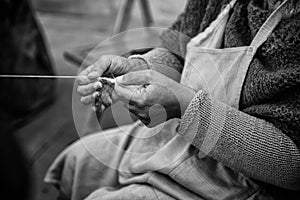 Spinning with a wooden spinning wheel