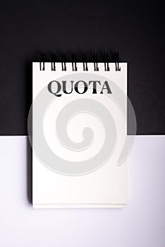 Spiral binder notebook mock up on black and white background. concept Quota equality or demands at work