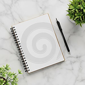 A spiral-bound notebook with blank pages is placed on a white marble surface