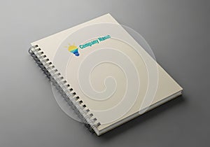 Spiral bound notebook with colorful logo isolated on white background