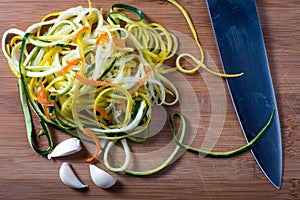 Spiral cut pasta on a cutting board