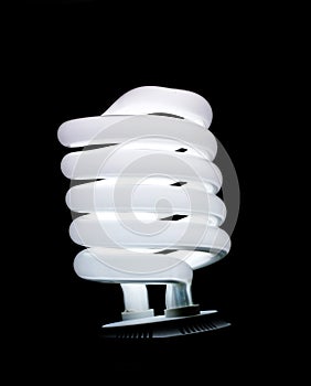 Spiral fluorescent lamp isolated on black