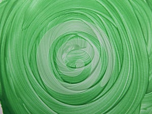 The spiral of green paint with volume effect