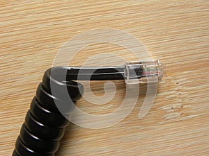 Spiral landline telephone cable jack