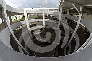 Spiral multi storey carpark of an industrial building. Fisheye view.