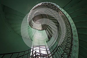 Spiral old green and grunge staircase